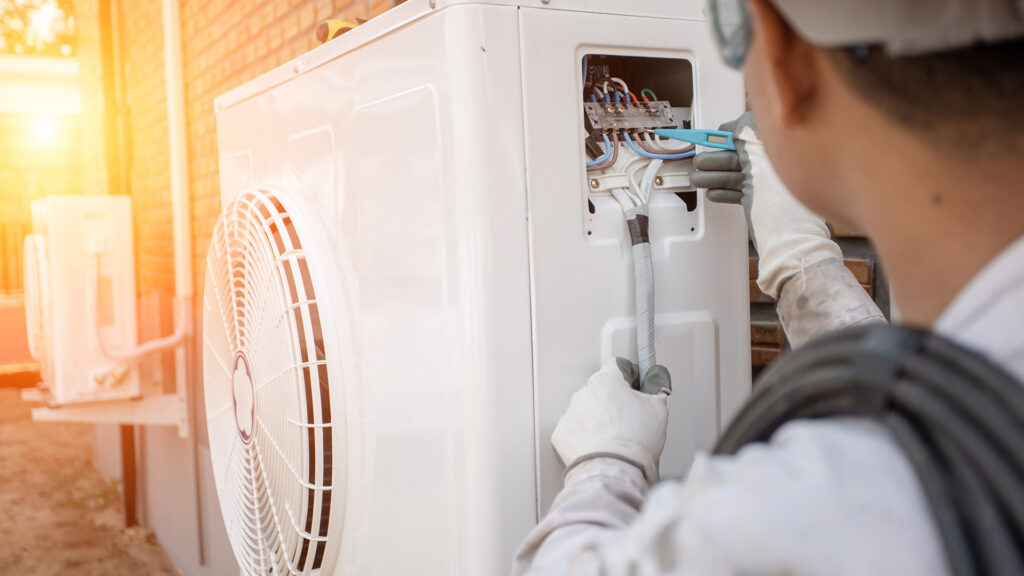 man repairing hvac norcross ga