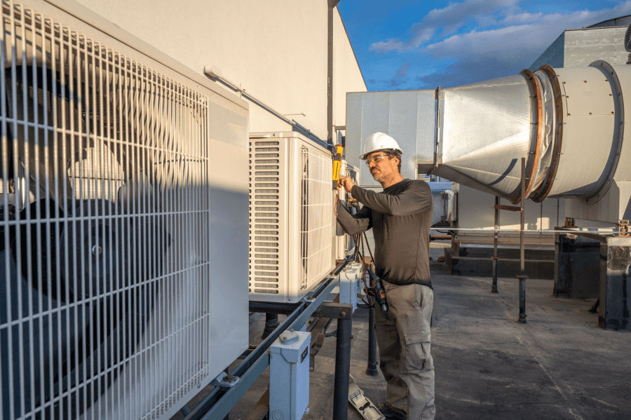 worker checking some hvac installations